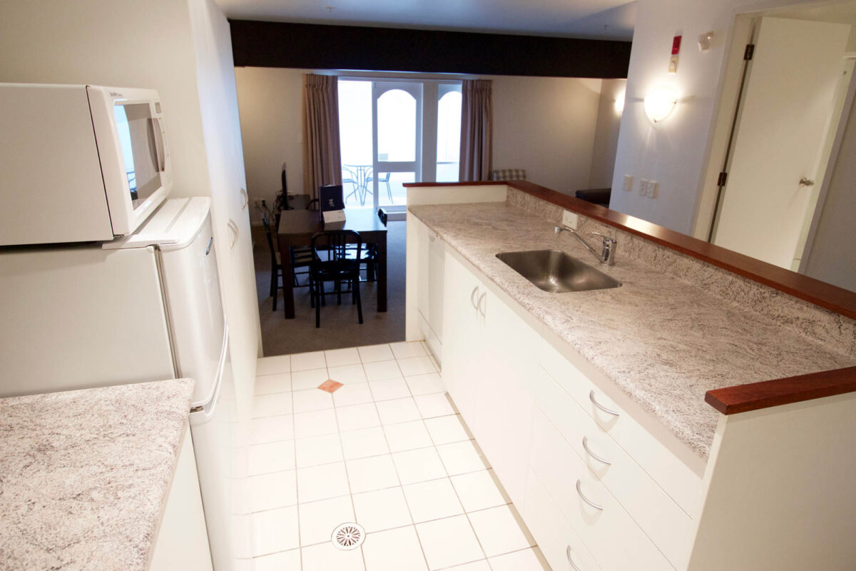 Kitchen + Lounge - Willis Village 2 Bedroom Apartment